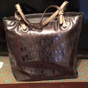 Metallic gray Micheal Kors bucket tote